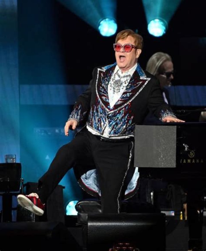 Why Was Elton John Knighted?